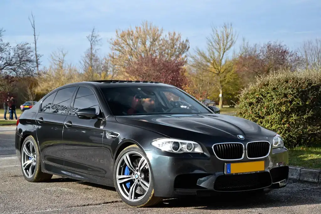 BMW 5 Series F10 front side almostcarreviews