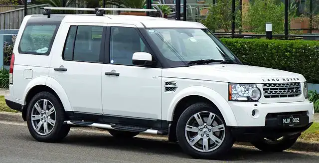 Land Rover Discovery LR4 side front v2 almostcarreviews